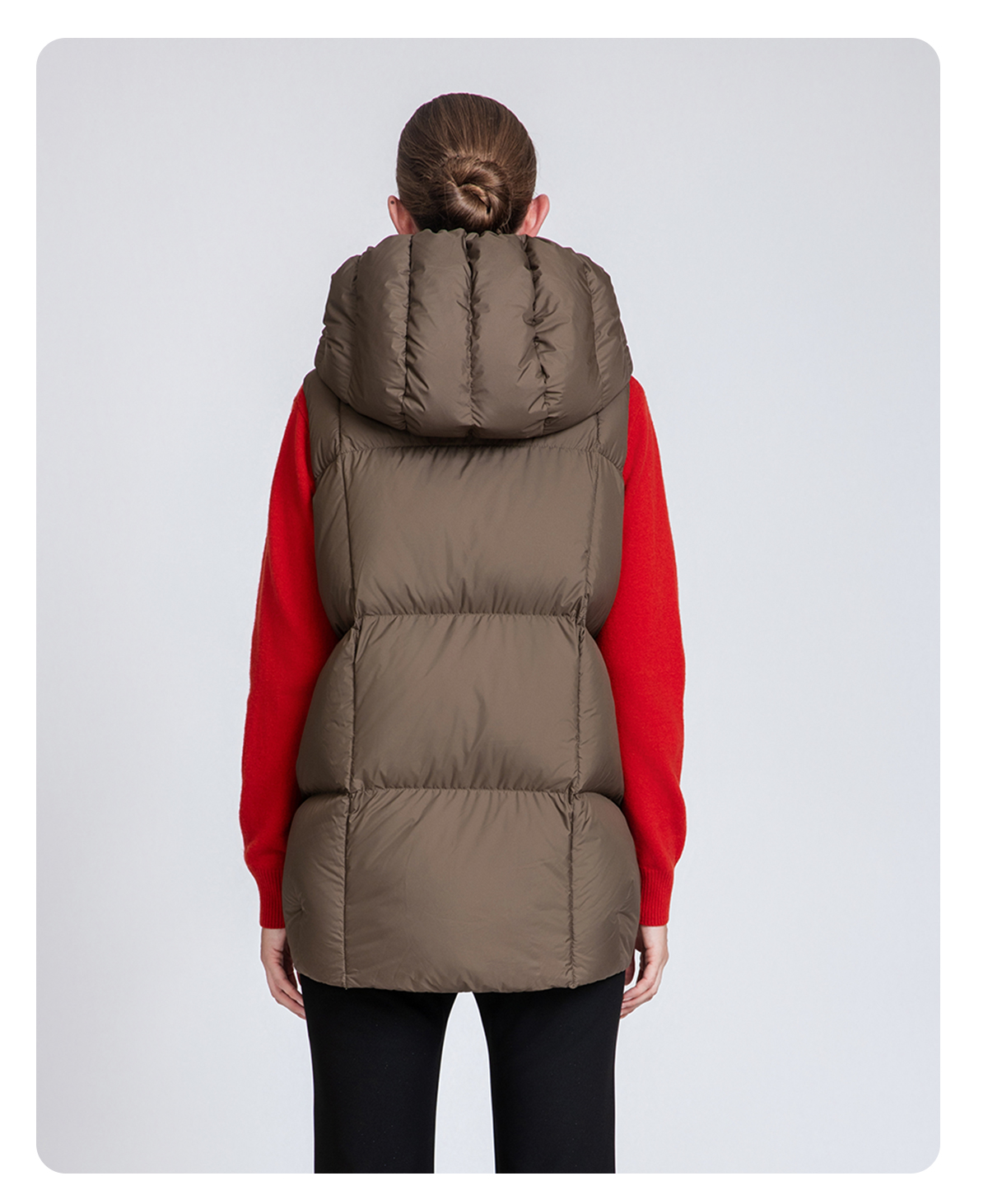 Women's thickened hooded down vest.